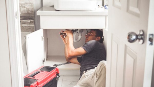 plumbing fixing under the sink